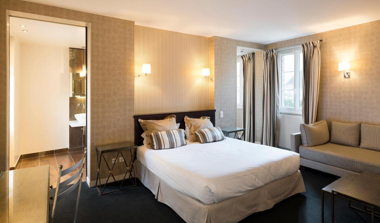 Logis - Hotel & Restaurant Du Tribunal モルターニュ・オー・ペルシュ エクステリア 写真