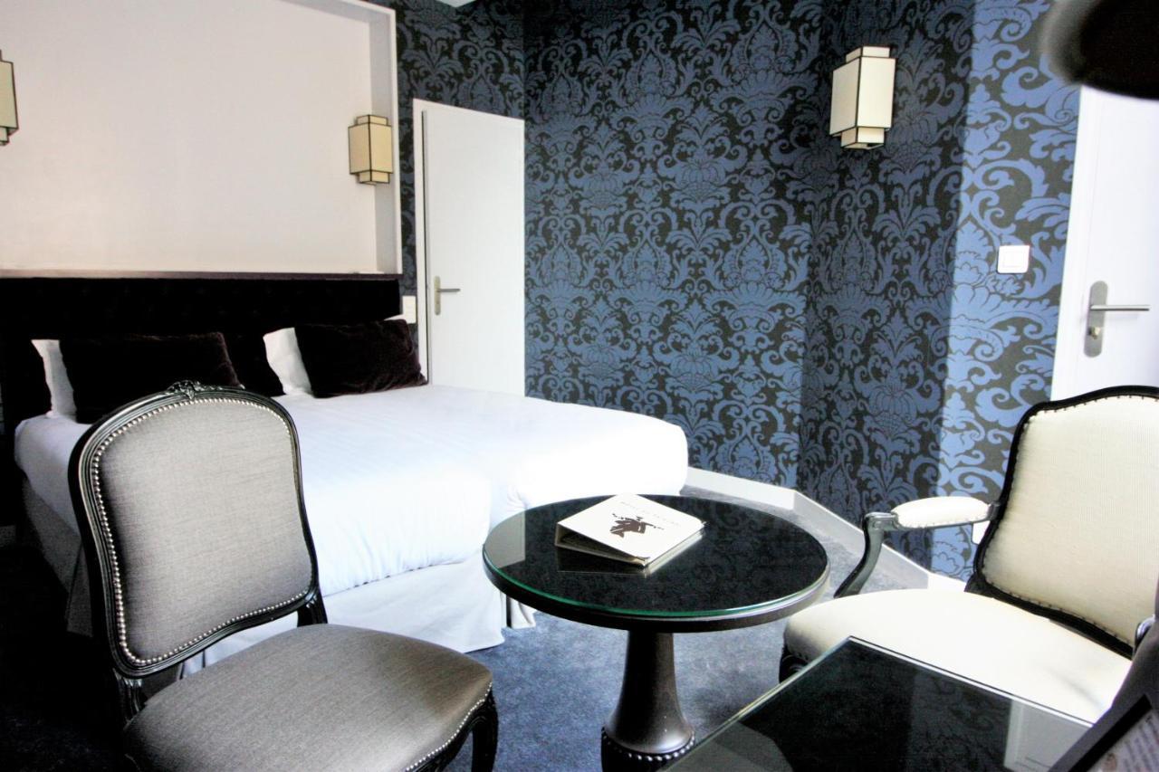 Logis - Hotel & Restaurant Du Tribunal モルターニュ・オー・ペルシュ エクステリア 写真