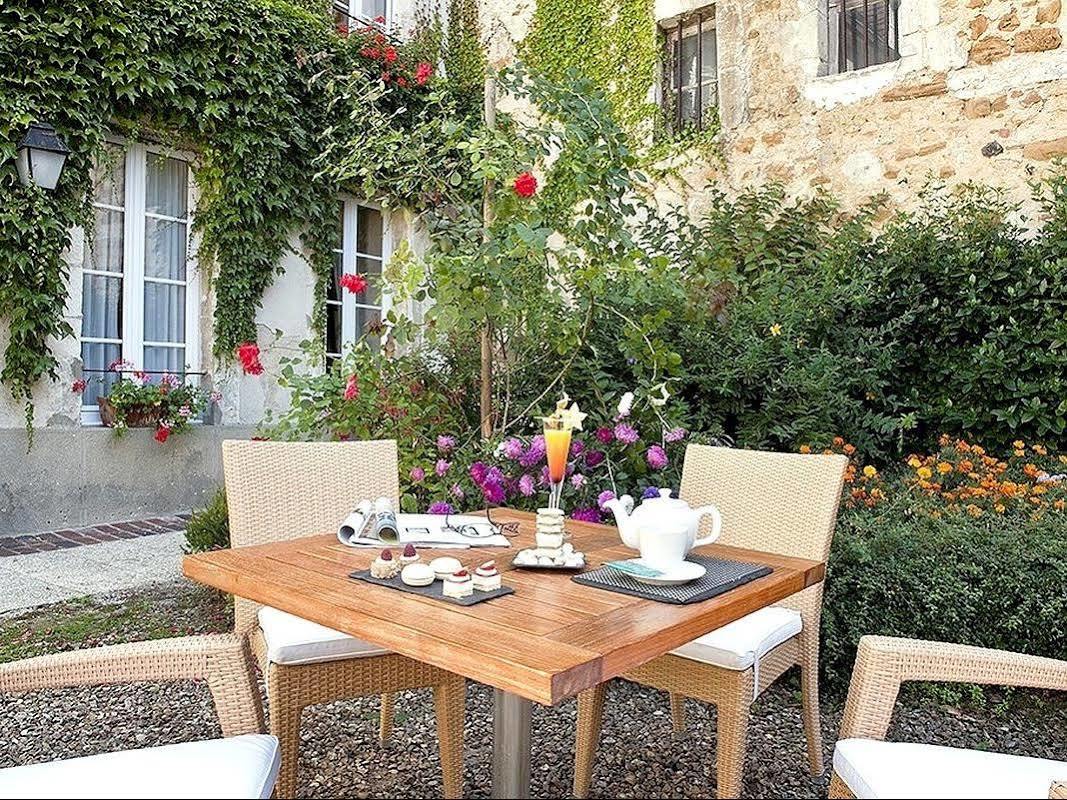 Logis - Hotel & Restaurant Du Tribunal モルターニュ・オー・ペルシュ エクステリア 写真